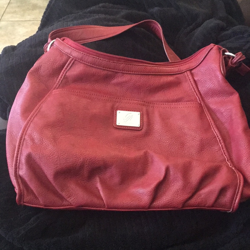 Red grace adele lily purse and a cream grace adele